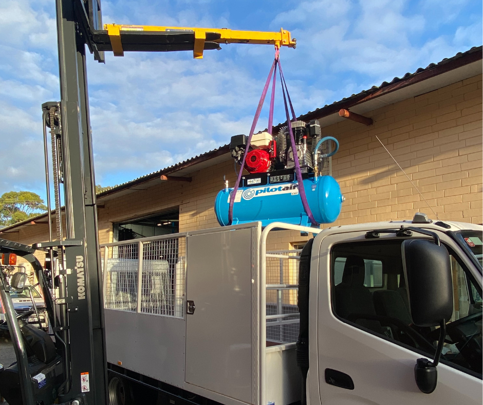 Pilot Air K30P Compressor being installed on a service vehicle