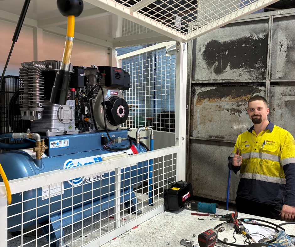 Air & Power technician servicing diesel driven Pilot Air compressor